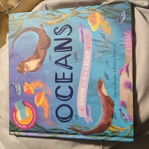 NWOT Ocean Shine-a-light Book